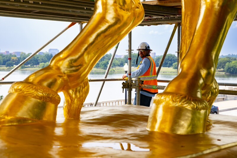 Trumps Statue Gilding Criticized as US Faces Financial Strain