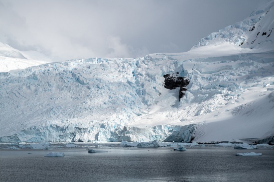 Antarctic Ice Sheet Mass Increases: Phased Slowdown Observed