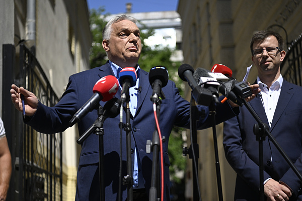 Hungarian Prime Ministers Wine-Spraying Moment Highlights Rapid Political Transformation