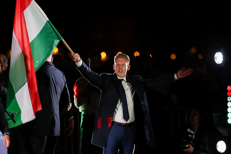 Hungarian Prime Ministers Wine-Spraying Moment Highlights Rapid Political Transformation